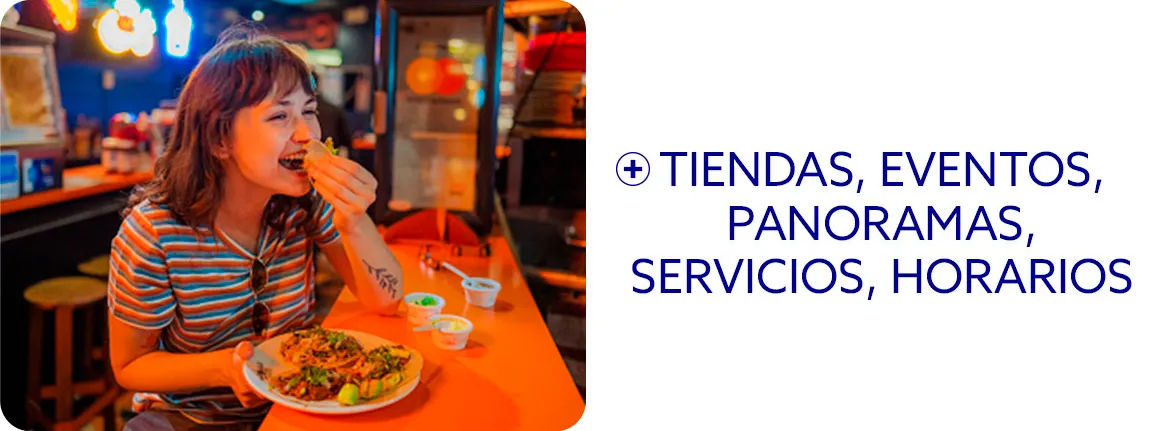 Imagen de mujer comiendo con cara de felicidad en un restaurante